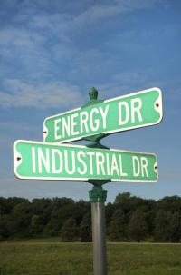 street signs at crossroads of energy and industrial drives